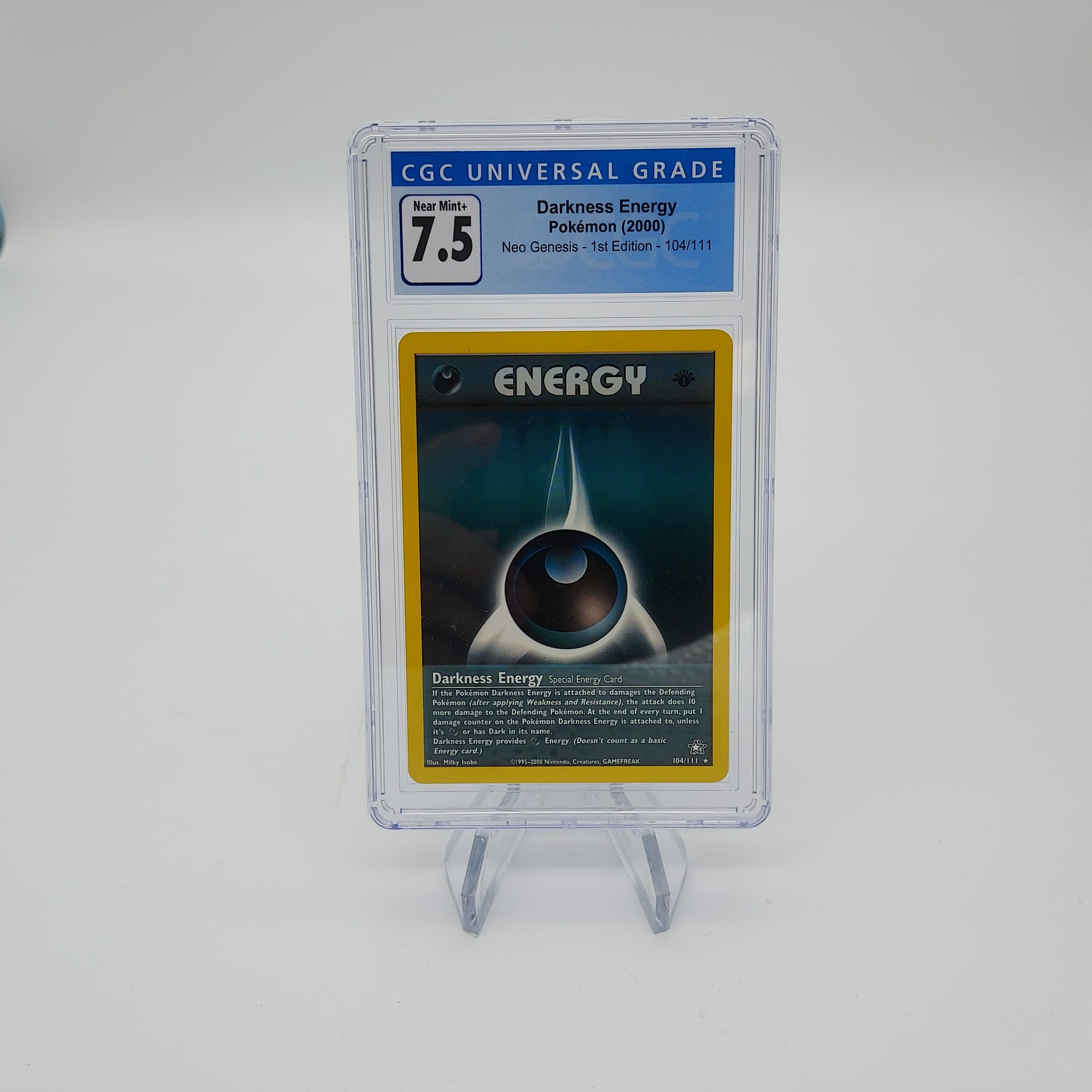 Pokemon Darkness Energy - Neo Genesis 1st Edition - 104/111 CGC - Near Mint+ 7.5